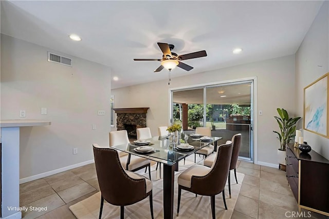 5347 E Bergh Dr, Anaheim Hills, CA 92807 - dining space with a fireplace, ceiling fan, and recessed lighting