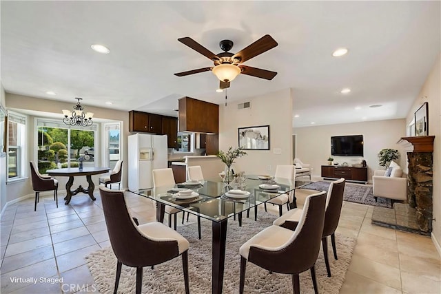 5347 E Bergh Dr, Anaheim Hills, CA 92807 - dining space featuring light tile patterned flooring, recessed lighting, ceiling fan, and a chandelier