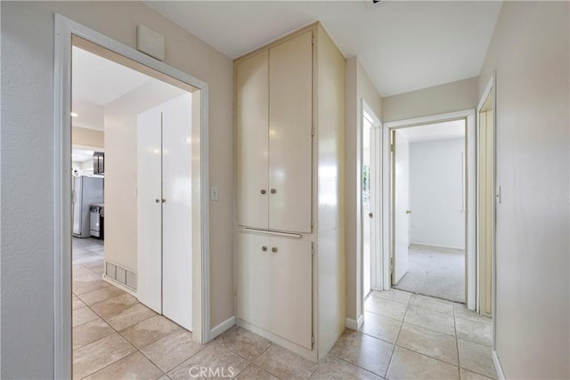 5347 E Bergh Dr, Anaheim Hills, CA 92807 - hall featuring light tile patterned flooring and baseboards