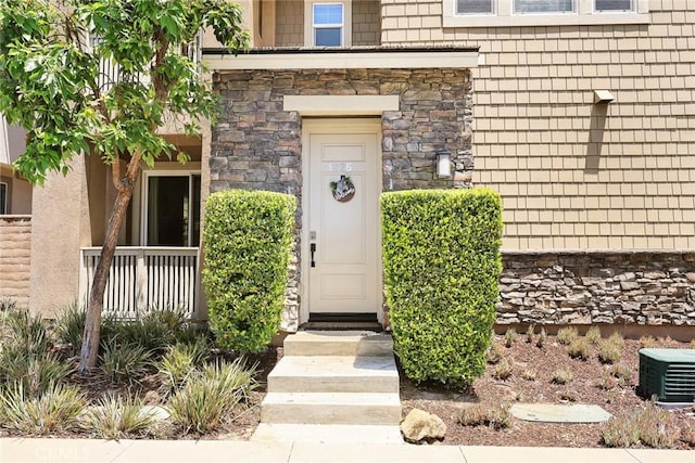 12260 Chorus Dr, Rancho Cucamonga, CA 91739 - view of exterior entry featuring stone siding