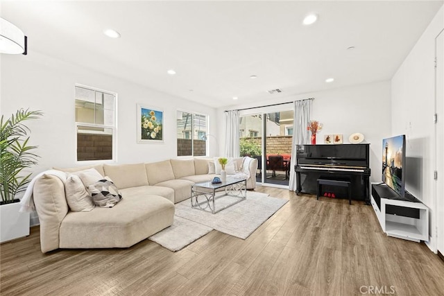 12260 Chorus Dr, Rancho Cucamonga, CA 91739 - living room featuring wood finished floors and recessed lighting