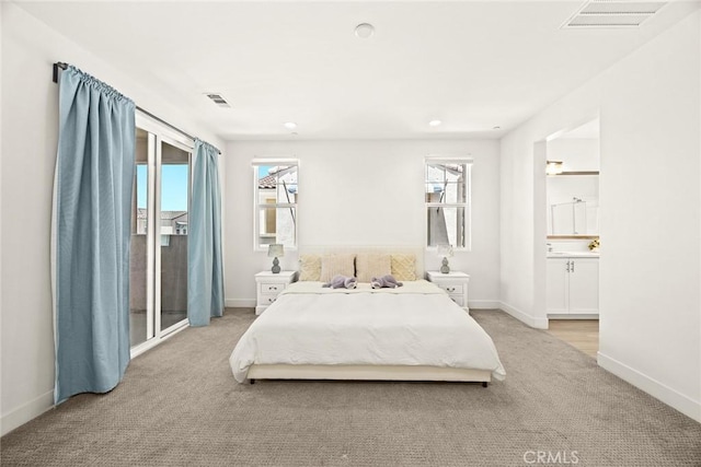 12260 Chorus Dr, Rancho Cucamonga, CA 91739 - bedroom with light carpet, connected bathroom, and access to outside