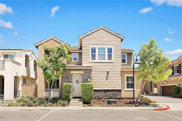 12260 Chorus Dr, Rancho Cucamonga, CA 91739 - view of front of home featuring stone siding and stucco siding