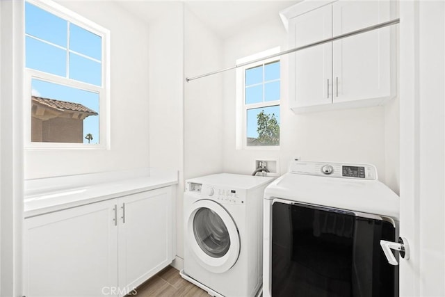 12260 Chorus Dr, Rancho Cucamonga, CA 91739 - laundry area featuring independent washer and dryer and cabinet space