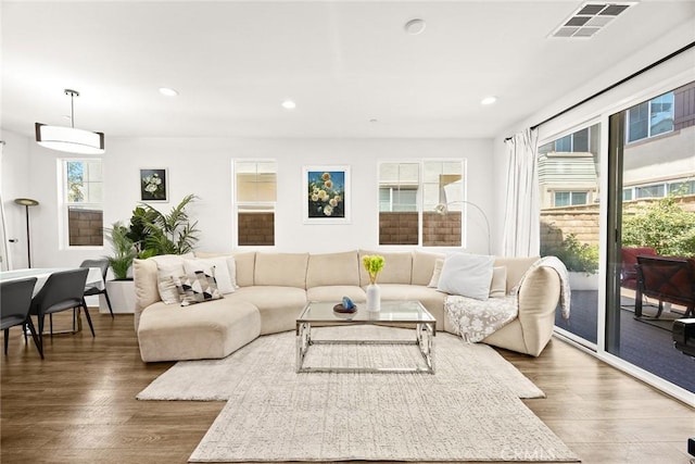 12260 Chorus Dr, Rancho Cucamonga, CA 91739 - living area with wood finished floors and recessed lighting