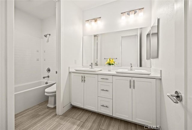 12260 Chorus Dr, Rancho Cucamonga, CA 91739 - bathroom with double vanity, bathing tub / shower combination, and wood finished floors