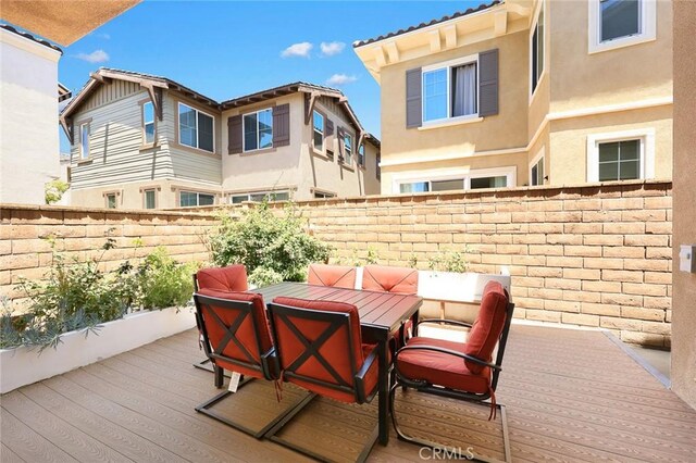 12260 Chorus Dr, Rancho Cucamonga, CA 91739 - fenced backyard featuring outdoor dining space and a wooden deck