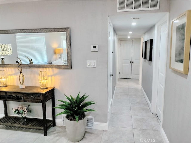 900 S Ann St, Tulare, CA 93274 - hallway featuring light tile patterned floors and recessed lighting