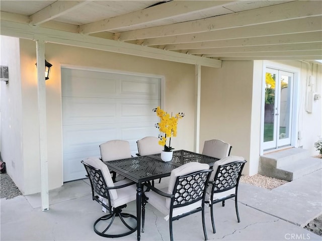 900 S Ann St, Tulare, CA 93274 - view of patio with french doors, a garage, and outdoor dining space