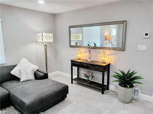 900 S Ann St, Tulare, CA 93274 - living area with baseboards and light tile patterned floors