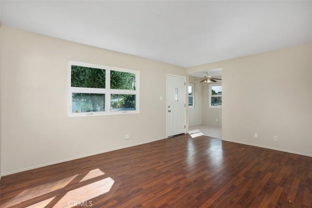 3746 Balboa Dr, Oceanside, CA 92056 - unfurnished living room with wood finished floors and baseboards