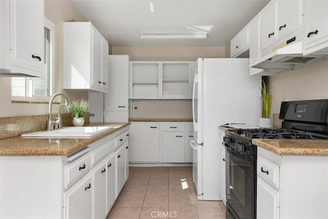 3746 Balboa Dr, Oceanside, CA 92056 - kitchen with gas stove, under cabinet range hood, light tile patterned flooring, white cabinets, and open shelves