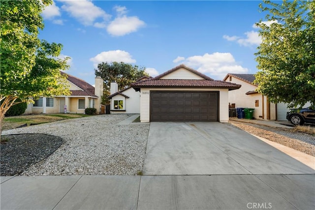 36829 Burroughs Way, Palmdale, CA 93552 - ranch-style house featuring driveway, a tile roof, and an attached garage