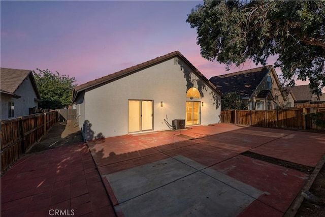 36829 Burroughs Way, Palmdale, CA 93552 - rear view of property featuring stucco siding, a patio, a fenced backyard, and a tiled roof