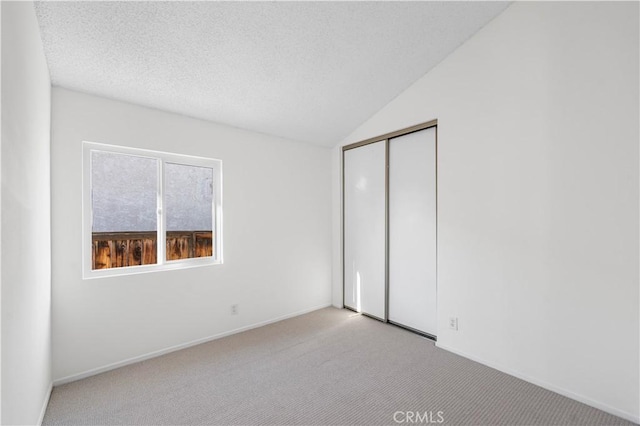 36829 Burroughs Way, Palmdale, CA 93552 - unfurnished bedroom with carpet flooring, a closet, and lofted ceiling