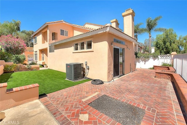 2914 Crape Myrtle Cir, Chino Hills, CA 91709 - back of property with stucco siding, a patio area, a chimney, and a tile roof