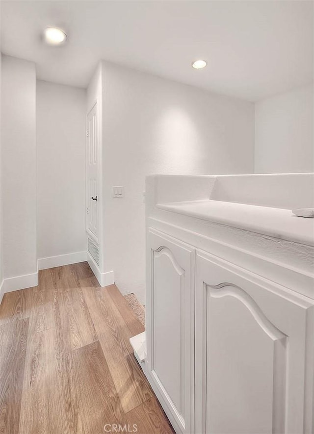 2914 Crape Myrtle Cir, Chino Hills, CA 91709 - corridor featuring light wood finished floors and recessed lighting