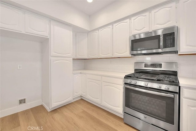 2914 Crape Myrtle Cir, Chino Hills, CA 91709 - kitchen with stainless steel appliances, light countertops, light wood-type flooring, tasteful backsplash, and recessed lighting