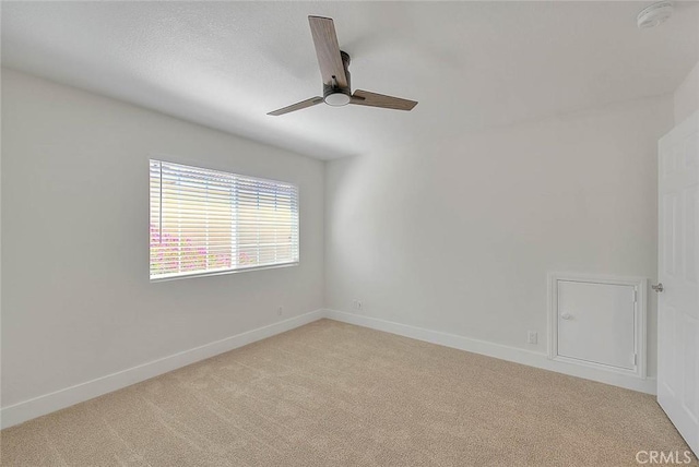 2914 Crape Myrtle Cir, Chino Hills, CA 91709 - empty room featuring light colored carpet, a ceiling fan, and a smoke detector