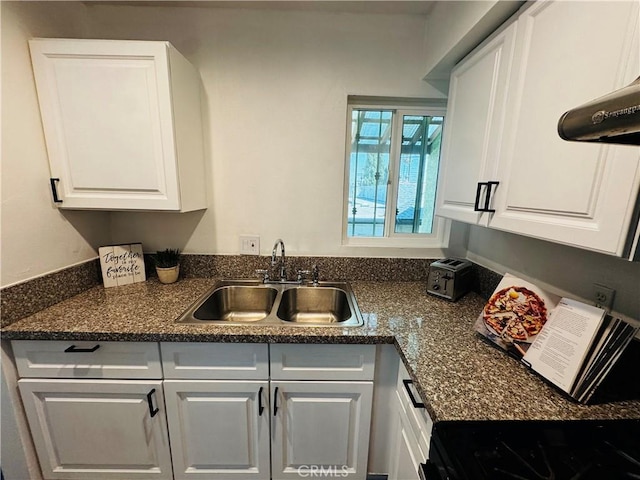 6155 Reseda Unit 4, Tarzana, CA 91335 - kitchen with white cabinets, dark countertops, and stove