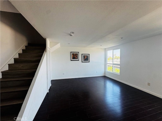 6155 Reseda Unit 4, Tarzana, CA 91335 - staircase with wood finished floors and a textured ceiling