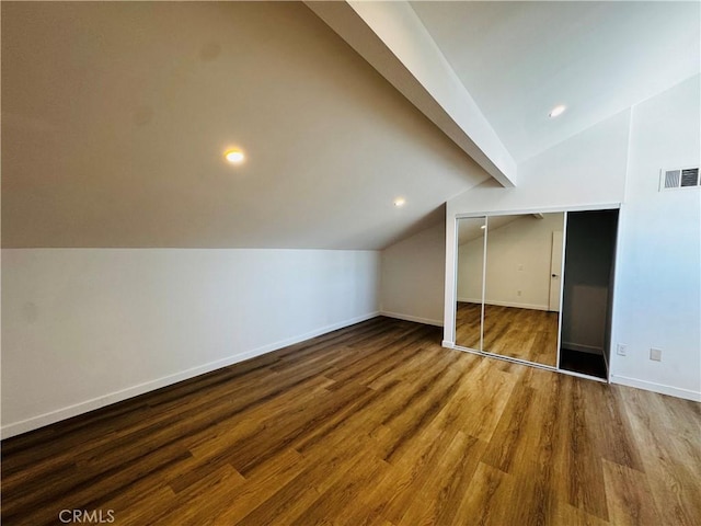 6155 Reseda Unit 4, Tarzana, CA 91335 - additional living space with vaulted ceiling, wood finished floors, and recessed lighting
