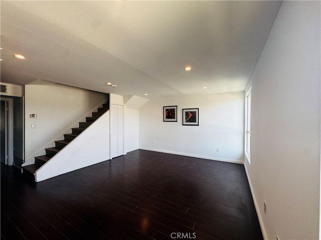 6155 Reseda Unit 4, Tarzana, CA 91335 - unfurnished living room with stairs, wood finished floors, and recessed lighting