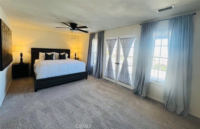 13330 Tamarisk Rd, Victorville, CA 92395 - bedroom featuring carpet, ceiling fan, and a textured ceiling
