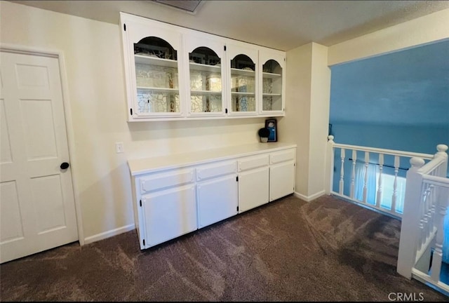 13330 Tamarisk Rd, Victorville, CA 92395 - bar with dark carpet and baseboards