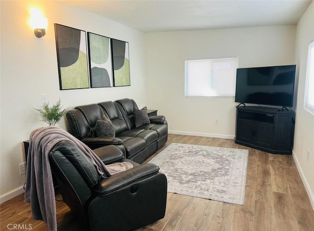 13330 Tamarisk Rd, Victorville, CA 92395 - living area featuring wood finished floors and baseboards