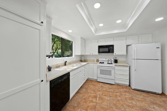 4205 Caminito Pintoresco, San Diego, CA 92108 - kitchen with black appliances, a raised ceiling, white cabinetry, crown molding, and light countertops