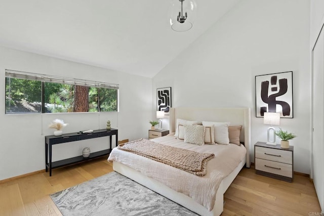 4205 Caminito Pintoresco, San Diego, CA 92108 - bedroom featuring high vaulted ceiling and wood finished floors