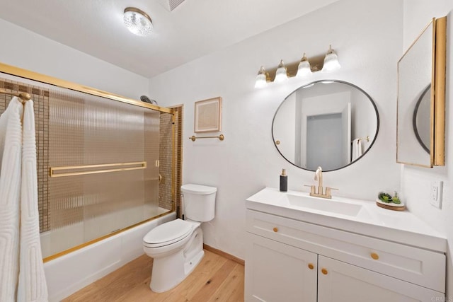 4205 Caminito Pintoresco, San Diego, CA 92108 - full bathroom featuring wood finished floors, vanity, and shower / bath combination with glass door