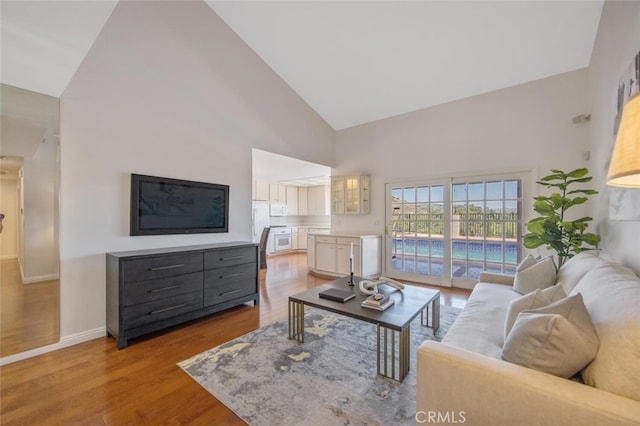 2039 Channelford Rd, Westlake Village, CA 91361 - living room featuring high vaulted ceiling and light wood finished floors