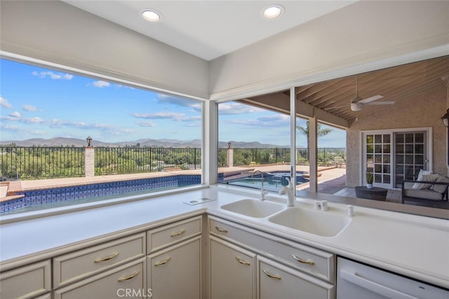2039 Channelford Rd, Westlake Village, CA 91361 - kitchen featuring white dishwasher, a mountain view, light countertops, gray cabinets, and recessed lighting