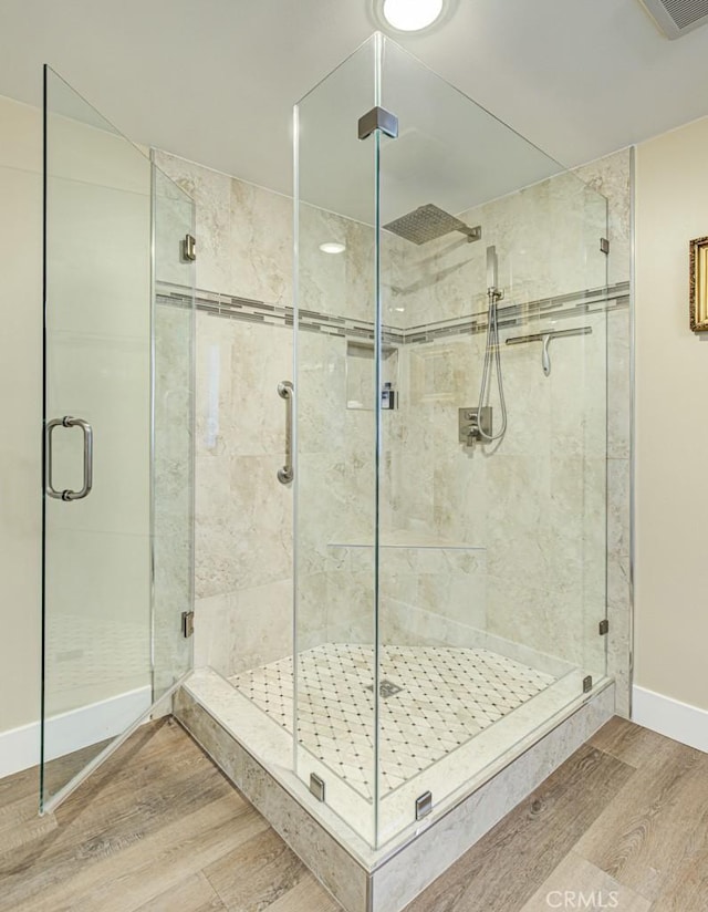 271 Avenida Sevilla Unit P, Laguna Woods, CA 92637 - bathroom featuring wood finished floors and a shower stall