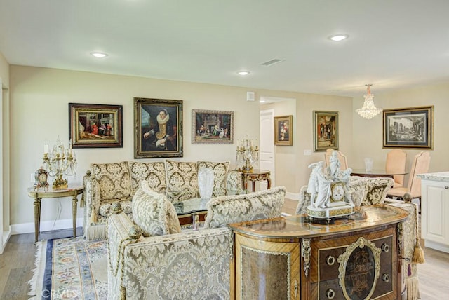 271 Avenida Sevilla Unit P, Laguna Woods, CA 92637 - living area featuring light wood-style flooring, a chandelier, and recessed lighting
