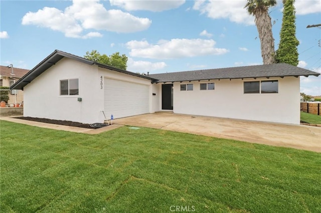 4203 Tolowa St, San Diego, CA 92117 - view of front of house with stucco siding, an attached garage, driveway, and a front lawn