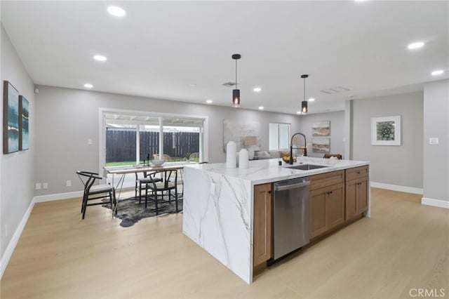 4203 Tolowa St, San Diego, CA 92117 - kitchen featuring dishwasher, light wood-style floors, recessed lighting, hanging light fixtures, and an island with sink