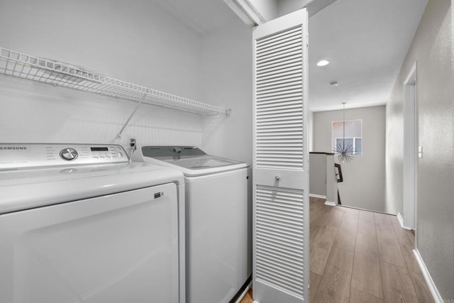 1347 Vallejo Mills St, Chula Vista, CA 91913 - washroom with separate washer and dryer and light wood-type flooring