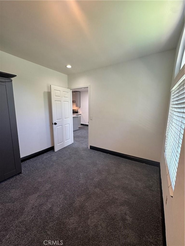 2835 Etiwanda Ave, Rialto, CA 92376 - spare room featuring dark carpet and recessed lighting