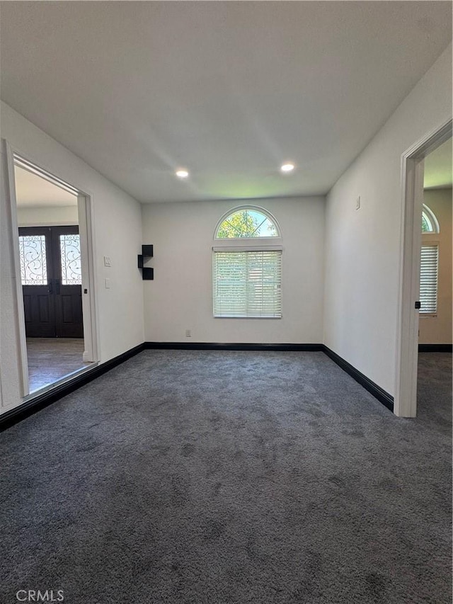 2835 Etiwanda Ave, Rialto, CA 92376 - spare room featuring plenty of natural light, carpet, french doors, and recessed lighting