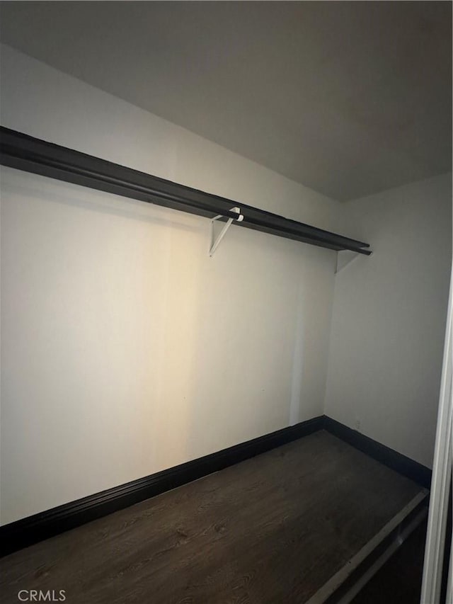 2835 Etiwanda Ave, Rialto, CA 92376 - spacious closet with dark wood finished floors