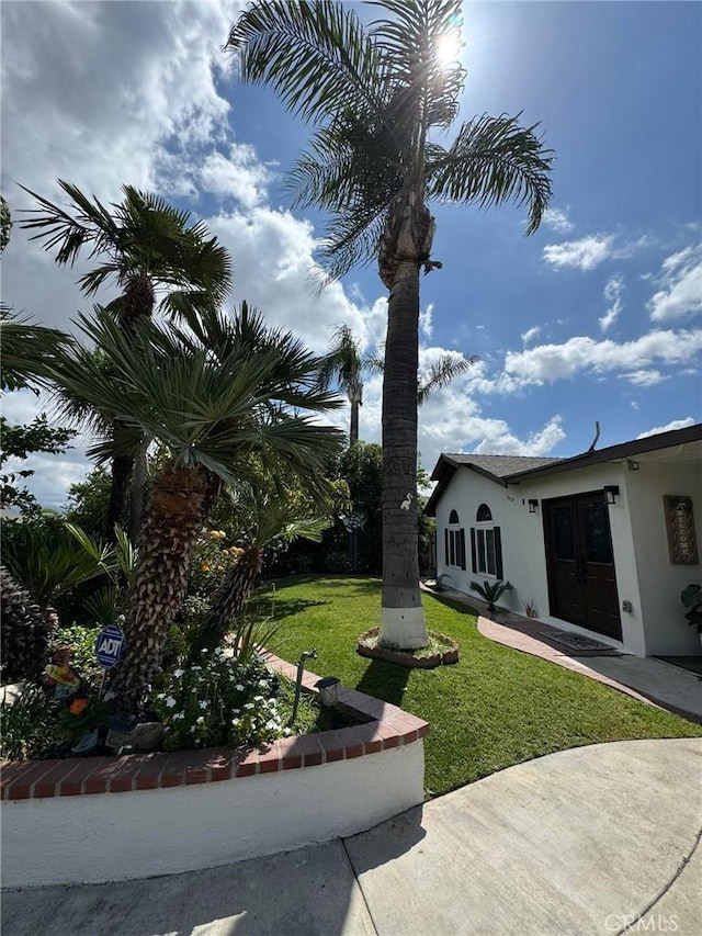 2835 Etiwanda Ave, Rialto, CA 92376 - view of green lawn with french doors