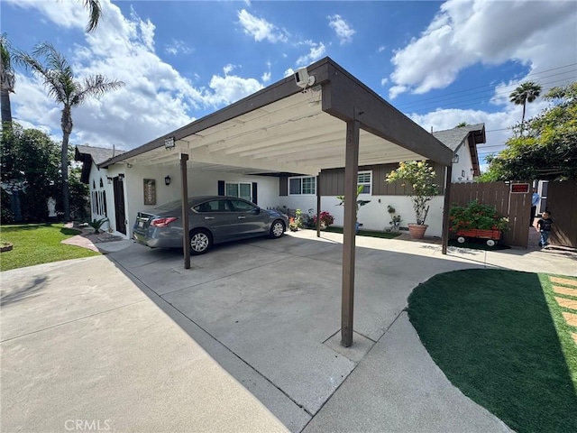 2835 Etiwanda Ave, Rialto, CA 92376 - view of parking with a carport and driveway