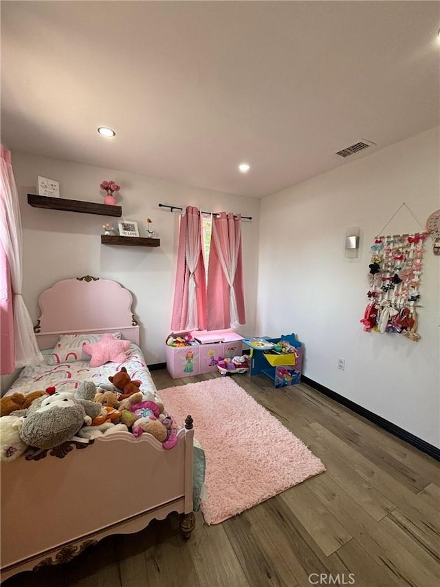 2835 Etiwanda Ave, Rialto, CA 92376 - bedroom featuring wood finished floors and recessed lighting