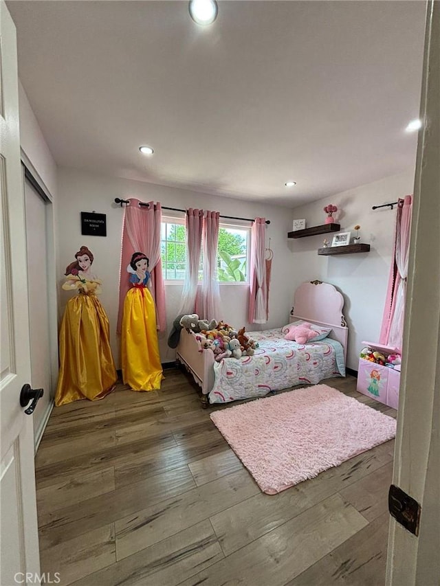 2835 Etiwanda Ave, Rialto, CA 92376 - bedroom with hardwood / wood-style flooring, recessed lighting, and a closet