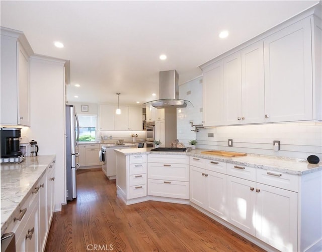 3530 Spearing Ave, San Pedro, CA 90732 - kitchen featuring island exhaust hood, stainless steel appliances, white cabinets, wood finished floors, and recessed lighting