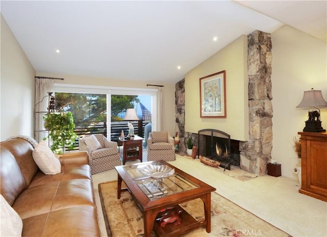 3530 Spearing Ave, San Pedro, CA 90732 - living area with vaulted ceiling, carpet flooring, and a stone fireplace