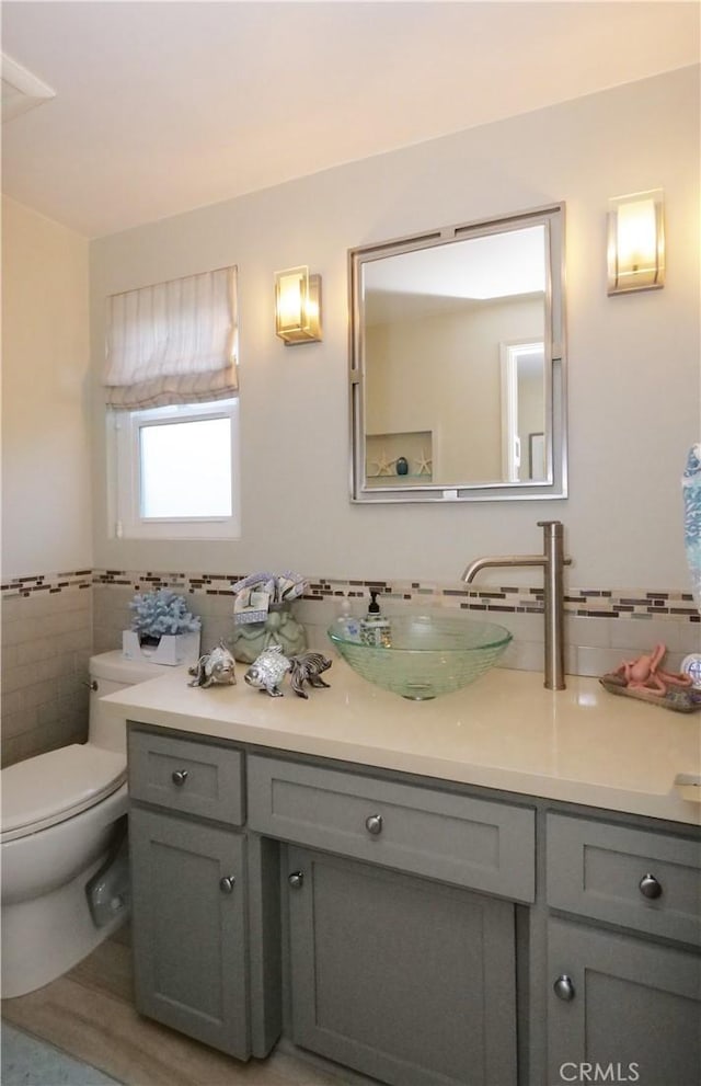 3530 Spearing Ave, San Pedro, CA 90732 - bathroom featuring vanity and tile walls